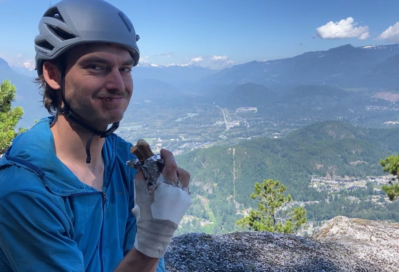 Eating some anti-bonk sausages atop North North Arete